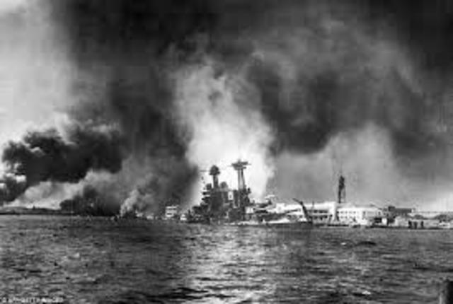 Japanese suprise attack US fleet at Pearl Harbor.