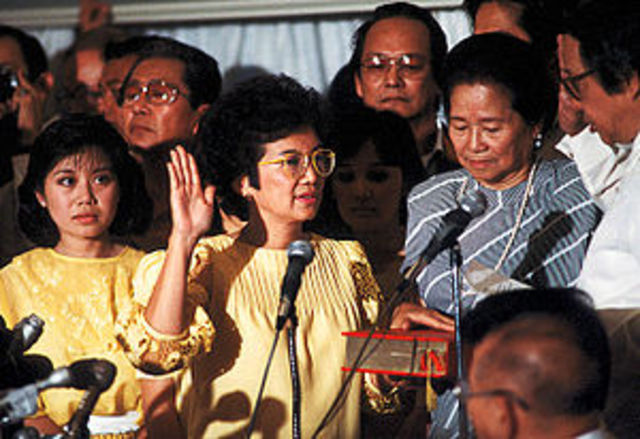 Election of Corazon Aquino ends Marcos dictatorship in Philippines