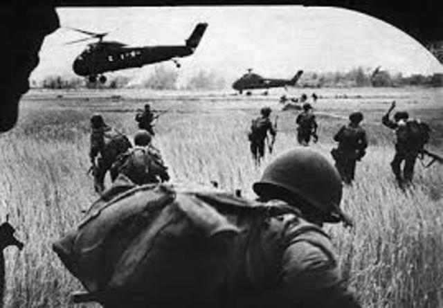 U.S. commits combat troops to South Vietnam.