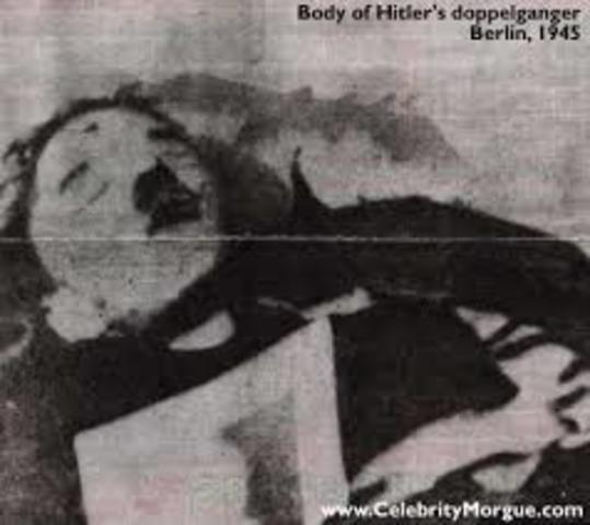 Adolf Hitler commits suicide
