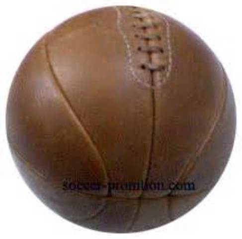 The first basketball was brown.