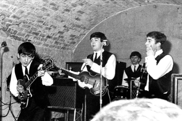 The Beatles debut at Liverpool's Cavern Club.
