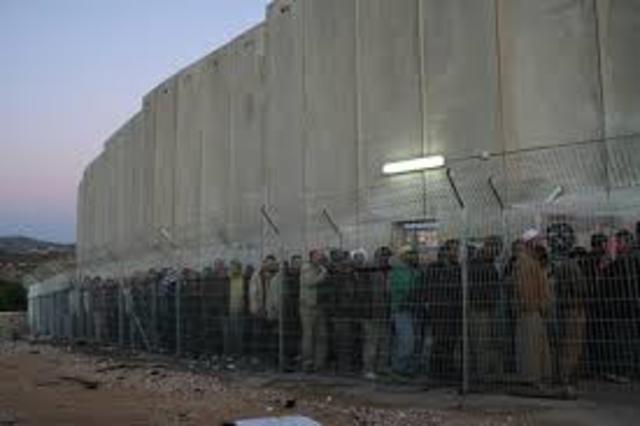 Israel begins constructing the West Bank Barrier