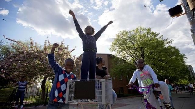 Baltimore mayor lifts citywide curfew after tensions ebb over death of Freddie Gray.