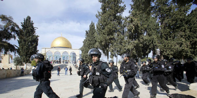 Palestinians riot after Ariel Sharon visits the Temple Mount in Jerusalem.