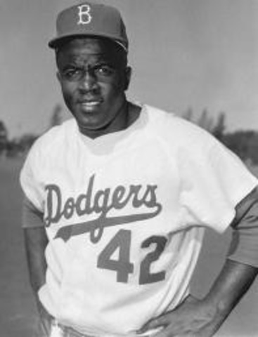 Jackie Robinson joins Brooklyn Dodgers
