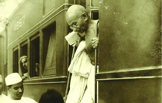 Gandhi is Thrown Of a Train