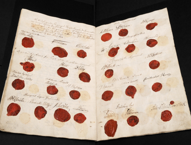 Grunnloven blir undertegnet.