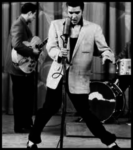 Elvis Presley sings and dances to "Hound Dog" on live TV