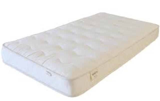 Amir frames Hassan by placing the money and watch under his mattress