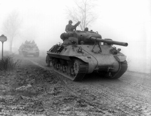 Battle of the Bulge, the last German offensive, begins in a frigidnorthern European winter