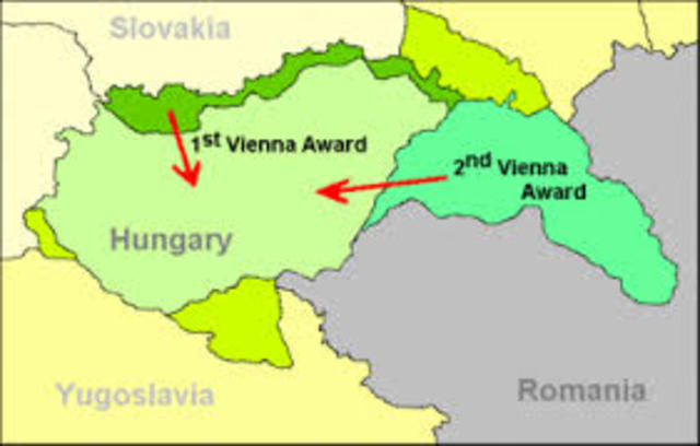 Second Vienna Award: Germany and Italy arbitrate a decision on the division of the disputed province of Transylvania between Romania and Hungary.