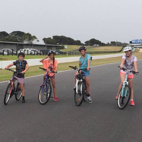 Jacob, Dylan, Victoria and I rode our bikes on the Grand Prix Track