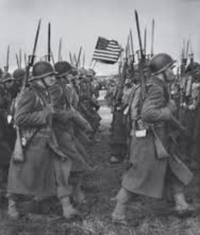 First American troops land in France.