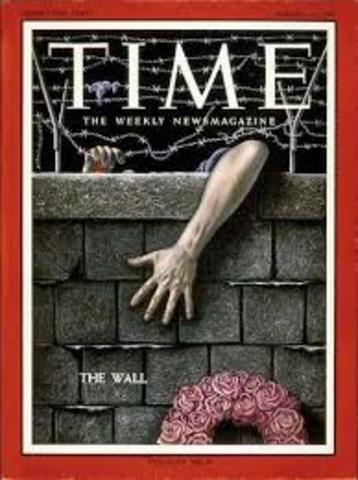 Construction of Berlin Wall Begins