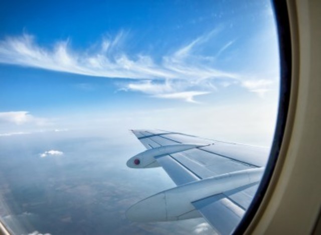 On the plane to EL SALVADOR