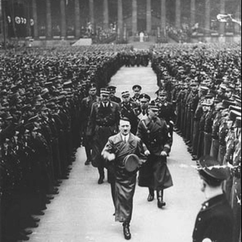 Hitler begins to build military