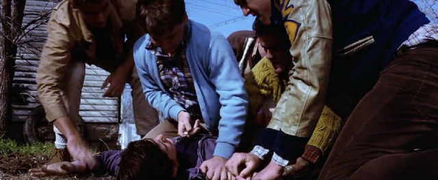 Ponyboy was jumped by the Socs.