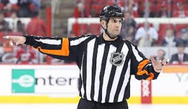 Started to referee hockey