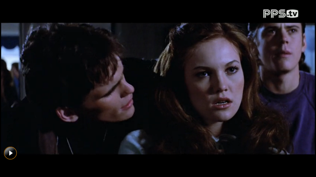 Ponyboy run into red-haired girl.