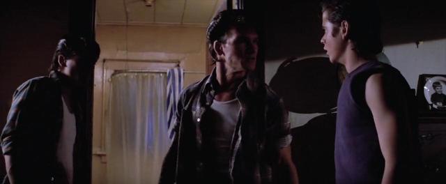 Darry blamed Ponyboy for being late and hit him.