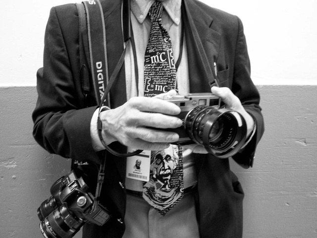 begin job as photojournalist