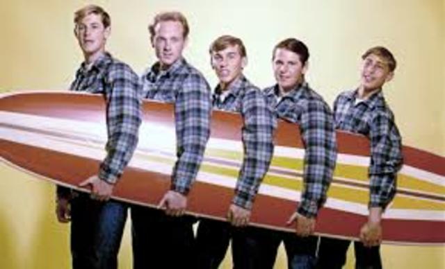 The Beach Boys’ first hits popularize the “California sound”