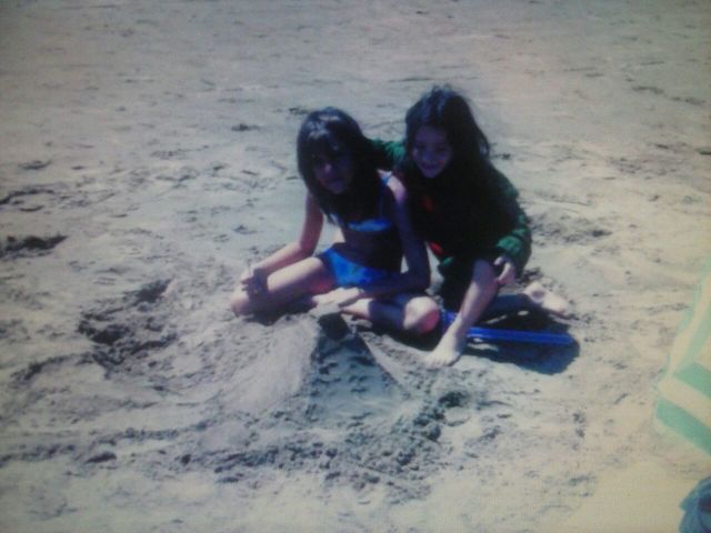 In the beach my sister and I  built a  tower with sand