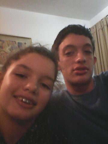 with my brother on home taking photos and eating frozen