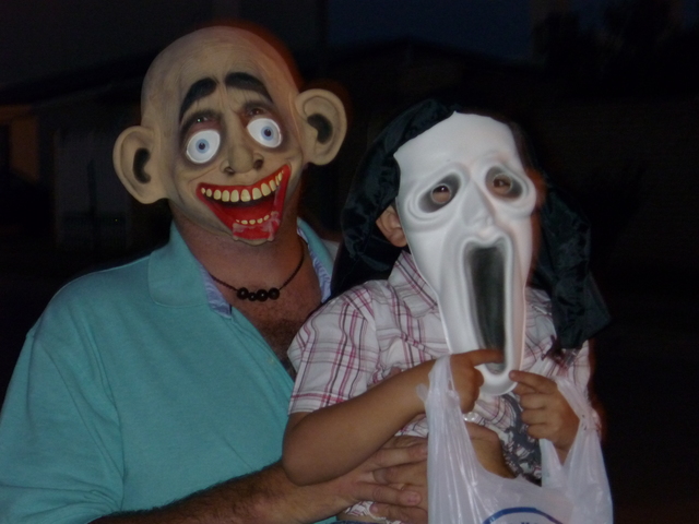 I went to a party in the street and I tricked Sweets...I had a  ghost mask.It was halloween night.