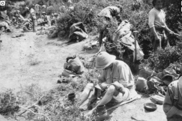Britain's Attack on the Vineyard (A Soldier making an Improvised Grenade at The Vineyard)