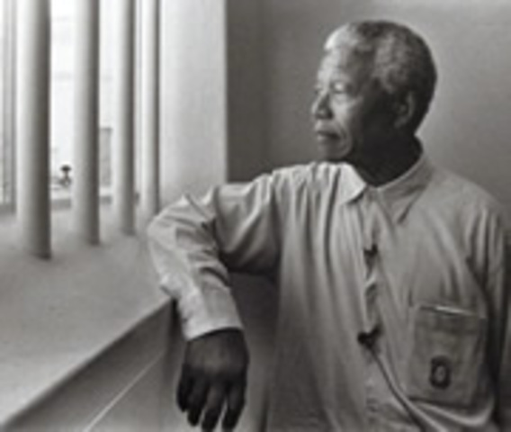 Nelson was charged with high treason  and sabotage while in jail and was sentenced to life