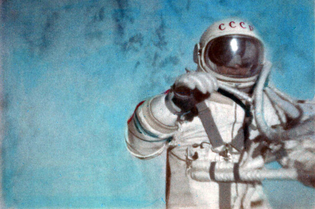 Alexei Leonov performs the first spacewalk