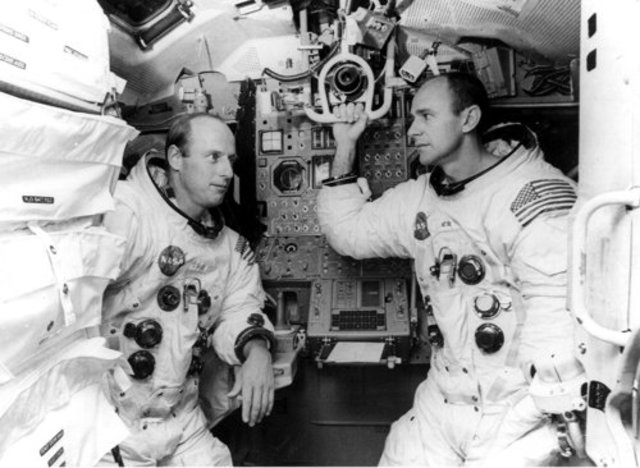 Pete Conrad and Alan Bean perform the first precision lunar landing