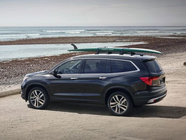 Dad bought a new car.