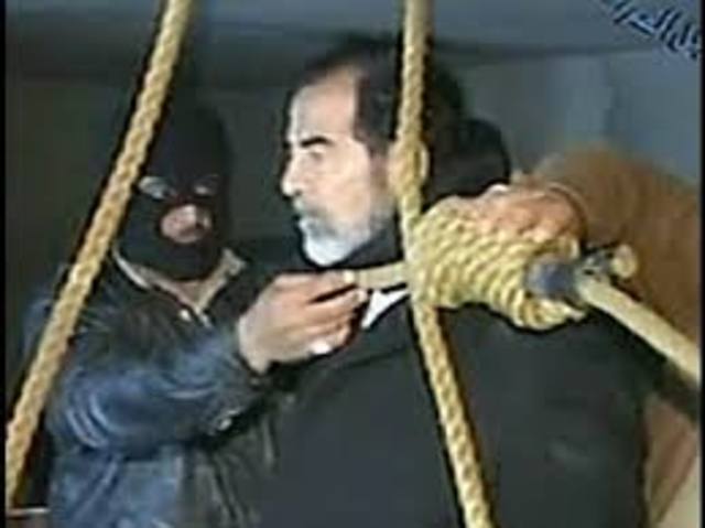 Saddam hangs.