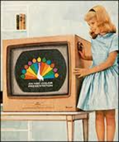 Color TV broadcasts begin.