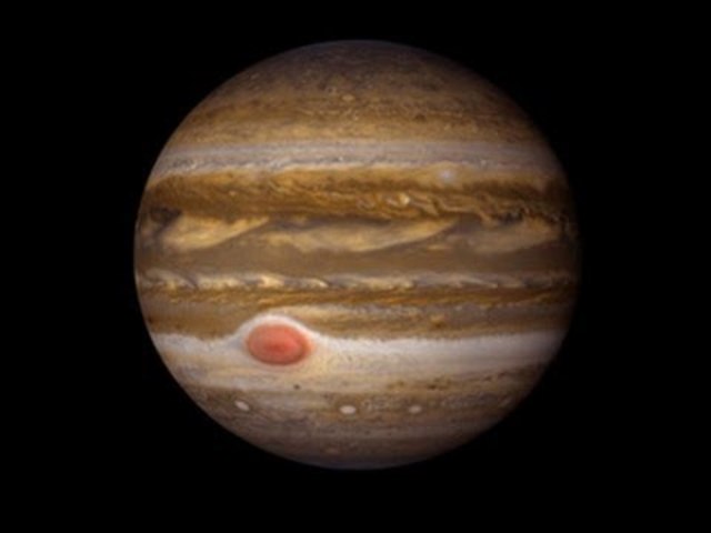 The Great Red Spot on Jupiter becomes prominent.