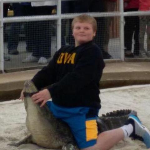 Setting on a alligator at Flordia