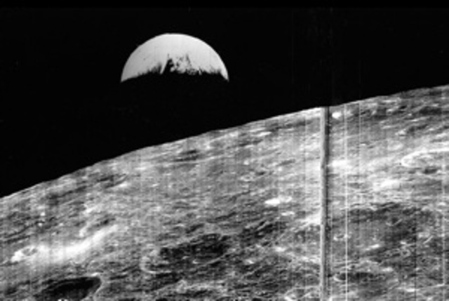 The first view of Earth from the moon was taken by Lunar Orbiter