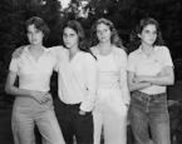 Nicholas Nixon takes his first annual photograph of his wife and her sisters: "The Brown Sisters"