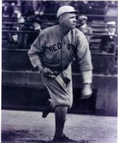 Babe Ruth enters baseball league, first real baseball card photo taken