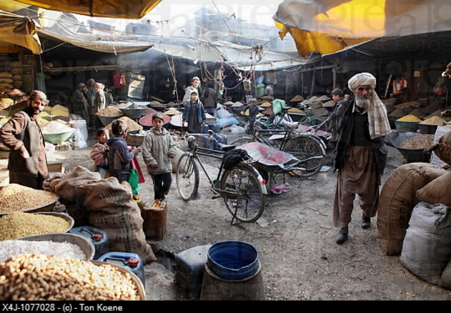 Parvana is in the market with her father