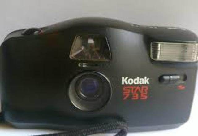 usando la camara fotografica  en paseos a cali