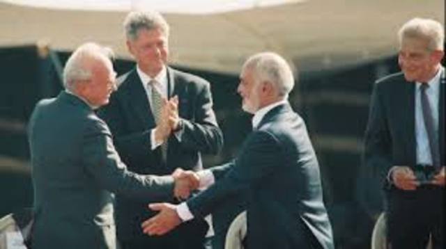 King Hussein and Yitzhak Rabin sign a Historical Peace Treaty