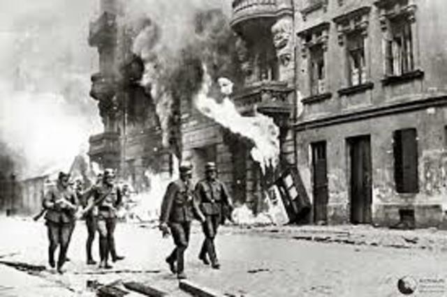 German infantry cautiously advance on the outskirts of Warsaw, Poland on September 16, 1939.