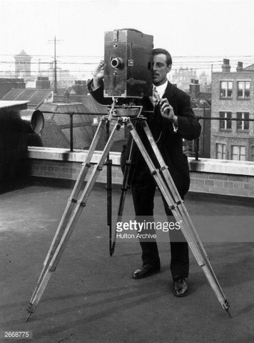 Edison calls his motion picture camera a kinetograph, and his peephole-viewing device a kinetoscope.