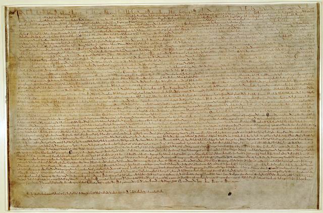 Magna Carta is signed by King John of England.