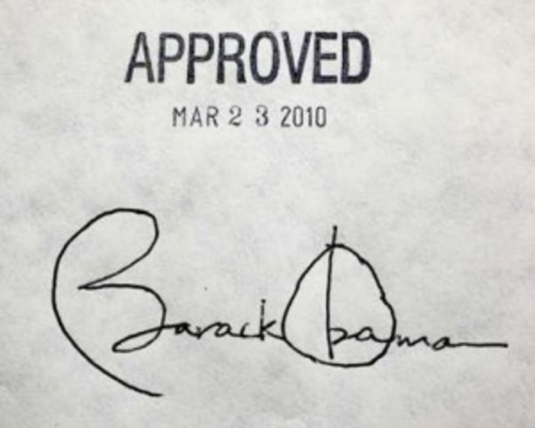 Obama Care Law Signed