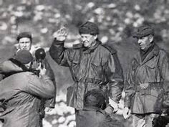 President Eisenhower visits Korea, fulfilling his campaign promise